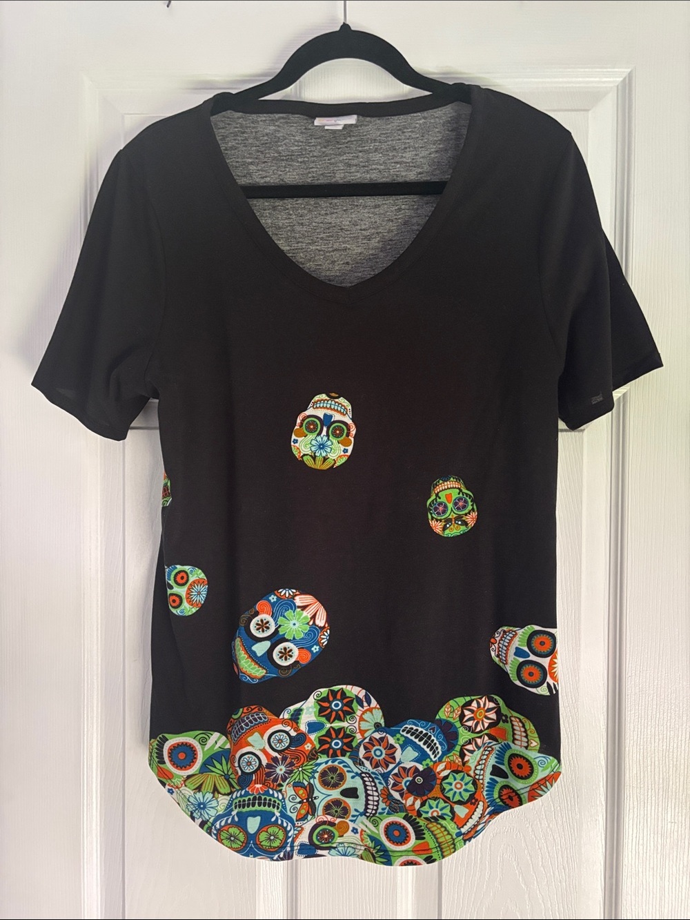 LuLaRoe Black V-Neck Short Sleeve Top with Colorful Sugar Skull Accents